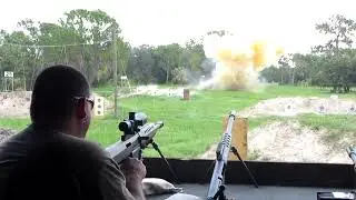 50 BMG sniper rifle vs  10 lb of binary explosives!