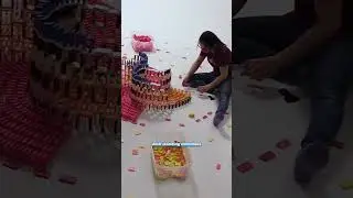 How We Built The Amazing QUADRUPLE Spiral! (15,000 Dominoes)