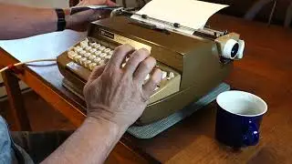 Smith-Corona Coronet Electric 12 typewriter at work