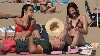Sitting on People's Beach Towels!