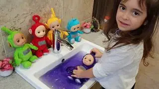 Teletubbies Playing and Swimming in the Pool