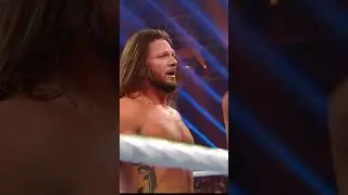 WWE - Ref moves Rollins' shoulder