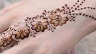easy stylish dotted mandala mehndi design with help of ear buds back hand  