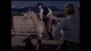 Jack Palance Mounts His Horse Backwards in 