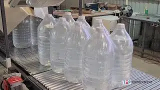 Упаковка бутылок ПЭТ 5 литров - машина ТМ - 1АП (прямоточная)