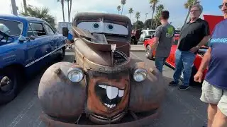 New car show called Wheels and Waves rolls into local harbor parking lot