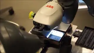 Atlas Copco - Assembly of needle bearings in one gear with ABB YuMi