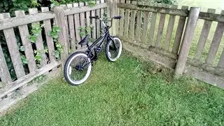 on my bmx doing tricks 150 subs!!!