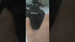 nikon D3100 kesalahan tekan lagi tombol lepas rana