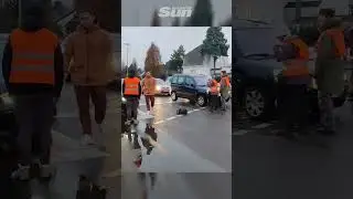 Van drives straight through Just Stop Oil protesters as they try to block the road