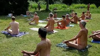 Nudists in Paris: Naturalists frolic in the Parisian sun on ‘naked day’
