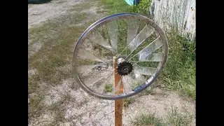 A wind turbine made from a bicycle wheel. What kind of wind is needed? First tests.