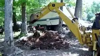 John Deere 2010 Diesel Backhoe Loader.