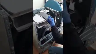 Aerial view Repair:This noisey LG washer had faulty dampeners and a broken dryer heating duct
