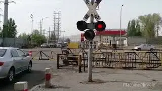 China Railway | Cargo Train Railway Crossing in Heavy City Traffic