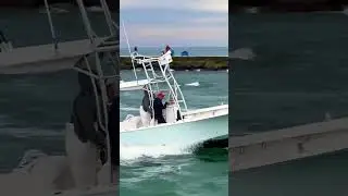Fast boat enters Haulover Inlet