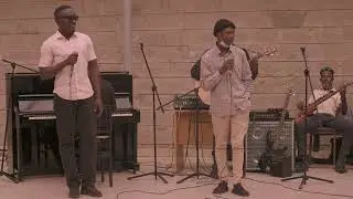 Jaju Owila, Cerullo Morris and Brian Lemaiyan  performing  Melanin by Sauti Sol