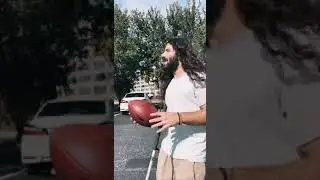Rob Gronkowski catches a football thrown by a blind man