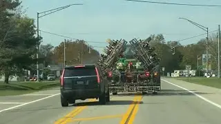 Impatient driver almost causes wreck passing Farm equipment
