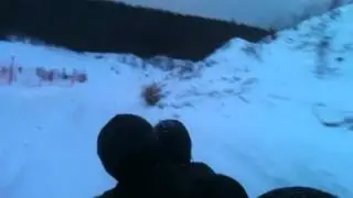 С горки на ватрушках паровозиком ;D