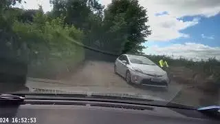 Toyota driver endangered cyclists life by idiotic overtaking with oncoming traffic!