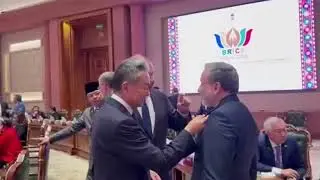 Friendly faces at BRICS—Iran, Russia, and China top diplomats chat on summit sidelines