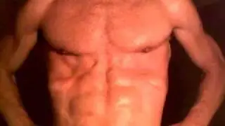abs & upper body muscle flexing wet