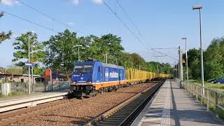 Raildox 482 035-3 mit einem leeren Holzzug in Bestensee