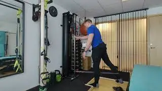 Legextension standing with external rotation.