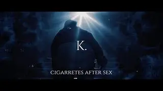 K.