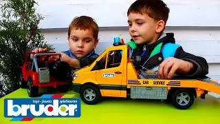 Эвакуатор Mercedes-Benz Sprinter и джип Bruder 02535