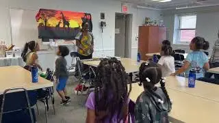 Oasis Campers with a Storyteller