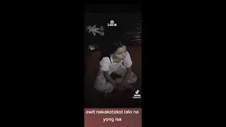 isang bata na may kalarong multo