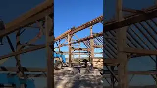 Reclaimed timber raising for a barndominium