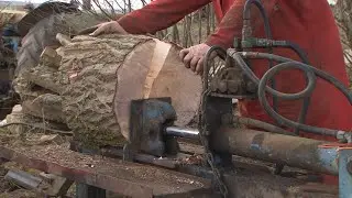 Wood splitting with old Ford tractor, hoist and scissor grab