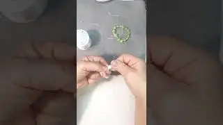 How to tie a knot in an elastomer bracelet 