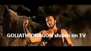 MARK FOREST shown on TV. GOLIATH and the DRAGON in background.