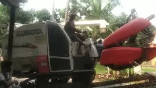 Riskey unloading Harvester
