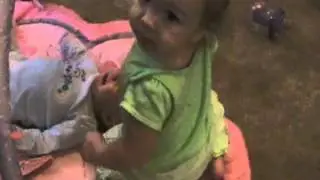 Little baby girl Mateah hurting baby brother Eliah, Fall 2009
