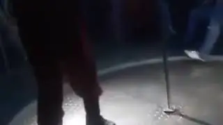 strongman carries girl while tearing up cards