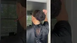 Sleek bun on thick curly hair #shorts