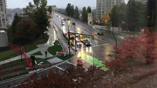 Intersection timelapse on a rainy morning - Royalty Free Stock Video