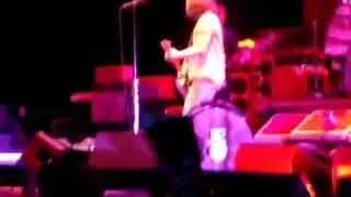 Elderly woman behind the counter in a Small Town - Pearl Jam - Live London O2 Arena 18th Aug 09