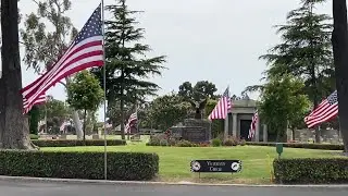 Ivy Lawn Memorial Park flying flags of military men and women in honor of Memorial Day
