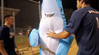 Crashing softball game in SHARK COSTUME
