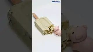 Pig greedily eats ice cream