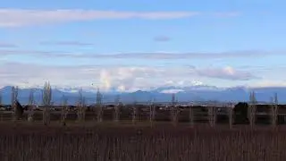 A Peaceful, Relaxing View Of Mountains And Clouds