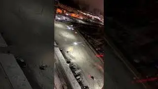 Дристы на парковке съемка с высоты.