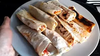 I take pita bread, stuffing and a delicious hot snack is ready in 3 minutes. thin lavash