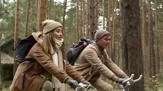 Two People Having A Conversation While Riding In Bicycles In The Woods | Free Stock Video Footage 4K